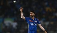 Mumbai Indians' Akash Madhwal prepares to catch a ball during the Indian Premier League (IPL) Twenty20 eliminator cricket match between Lucknow Super Giants and Mumbai Indians at the MA Chidambaram Stadium in Chennai on May 24, 2023. (Photo by R. Satish Babu / AFP)