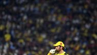 Chennai Super Kings' captain Mahendra Singh Dhoni adjusts the field during the Indian Premier League (IPL) Twenty20 final cricket match between Gujarat Titans and Chennai Super Kings at the Narendra Modi Stadium in Ahmedabad on May 29, 2023. (Photo by Sajjad Hussain / AFP)