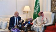 Lebanese Interior Minister of the Caretaker Government Bassam Mawlawi (left) and Saudi Ambassador to Lebanon Walid Bukhari 