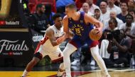 MIAMI, FLORIDA - JUNE 07: Nikola Jokic #15 of the Denver Nuggets dribbles against Kyle Lowry #7 of the Miami Heat during the third quarter in Game Three of the 2023 NBA Finals at Kaseya Center on June 07, 2023 in Miami, Florida. (Photo by Mike Ehrmann / GETTY IMAGES NORTH AMERICA / Getty Images via AFP)