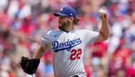 Clayton Kershaw #22 of the Los Angeles Dodgers pitches in the first inning against the Cincinnati Reds at Great American Ball Park on June 08, 2023 in Cincinnati, Ohio. Dylan Buell/Getty Images/AFP (Photo by Dylan Buell / GETTY IMAGES NORTH AMERICA / Getty Images via AFP)
