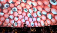 A waiter serves the food at the Alchemist restaurant in Copenhagen, Denmark, on May 25, 2023. (Photo by Sergei Gapon / AFP) 