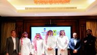 MEEZA and Ajlan Tech officials at the partnership event.