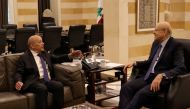Lebanese caretaker Prime Minister Najib Mikati (right) meets with France's new special envoy for Lebanon Jean-Yves Le Drian, in Beirut on June 22, 2023. (Photo by Anwar Amro / AFP)