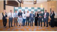 Officials pose for a group photo during the launch of Reno10 series.