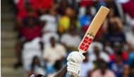 Rovman Powell of West Indies hits 6 during the first T20I match between West Indies and India at Brian Lara Cricket Academy in Tarouba, Trinidad and Tobago, on August 3, 2023. (Photo by Randy Brooks / AFP)