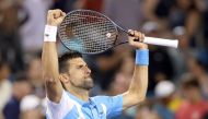 Novak Djokovic of Serbia celebrates his win against Taylor Fritz during the quarterfinals of the Western & Southern Open at Lindner Family Tennis Center on August 18, 2023 in Mason, Ohio  (Photo by MATTHEW STOCKMAN / GETTY IMAGES NORTH AMERICA / Getty Images via AFP)
