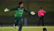Pakistan's Naseem Shah celebrates after Pakistan won by 1 wicket during the second one-day international (ODI) cricket match between Pakistan and Afghanistan at the Mahinda Rajapaksa International Cricket Stadium in Hambantota on August 24, 2023. (Photo by Ishara S. Kodikara / AFP)