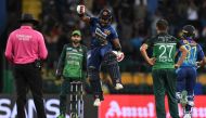 Sri Lanka's Charith Asalanka celebrates the win at the end of the Asia Cup 2023 Super Four one-day international (ODI) cricket match between Sri Lanka and Pakistan at the R. Premadasa Stadium in Colombo early September 15, 2023. (Photo by Farooq Naeem / AFP)