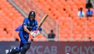 England's Dawid Malan plays a shot during the 2023 ICC men's cricket World Cup one-day international (ODI) match between England and New Zealand at the Narendra Modi Stadium in Ahmedabad on October 5, 2023. (Photo by Punit Paranjpe / AFP) /