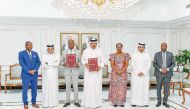 Minister of Commerce, Transport, Industry, and Tourism of Burundi, H E Marie Chantal Nijimbere and QC First Vice-Chairman Mohamed bin Twar Al Kuwari with other officials pose for a group photo. 