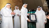 Minister of Municipality H E Dr. Abdullah bin Abdulaziz bin Turki Al Subaie and the Minister of Communications and Information Technology, H E Mohammed bin Ali Al Mannai pose with the Guinness World Record during the launch of the Smart Qatar TASMU Pavilion at Expo 2023.