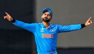 India's Virat Kohli dances to music during the 2023 ICC Men's Cricket World Cup one-day international (ODI) match between India and New Zealand at the Himachal Pradesh Cricket Association Stadium in Dharamsala on October 22, 2023. (Photo by Money Sharma / AFP)
