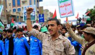 Members of Houthi-affiliated security forces Yemenis march during a rally in support of Palestinians on November 18, 2023. (Photo by MOHAMMED HUWAIS / AFP)
