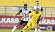 Al Gharafa's Yacine Brahimi controls the ball. 