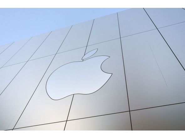 An Apple logo is seen on the outside of an Apple store as new iPhones are released for sale in San Francisco, California on September, 22, 2017. Photo by Josh Edelson / AFP
