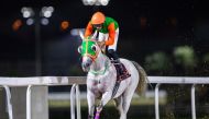 Faleh Bughanaim steers Ietibar during the feature race for Zekreet Cup at Al Rayyan Racecourse yesterday. PIC: Juhaim/QREC