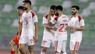 Al Arabi players celebrate during the quarter-final against Al Duhail. 
