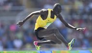 (FILES) Uganda's Benjamin Kiplagat competes in the Men's 3000m Steeplechase Round 1 during the athletics event at the Rio 2016 Olympic Games at the Olympic Stadium in Rio de Janeiro on August 15, 2016.  (Photo by Fabrice COFFRINI / AFP)