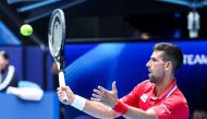 Serbia's Novak Djokovic hits a return to Czech Republic's Jiri Lehecka during their men's singles match during the United Cup tennis tournament in Perth on January 2, 2024. (Photo by COLIN MURTY / AFP)