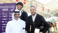 Minister of Sports and Youth H E Sheikh Hamad bin Khalifa bin Ahmed Al Thani with CSI3* - 1.45m class winner Ibrahim Hani Bisharat of Jordan (right) and runner-up Emanuele Gaudiano of Italy.