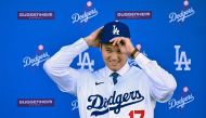 Japanese baseball player Shohei Ohtani attends a press conference on his presentation after signing a ten-year deal with the Los Angeles Dodgers at Dodgers Stadium in Los Angeles, California on December 14, 2023. Photo by Frederic J. Brown / AFP

