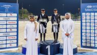 Maryam Ahmed Alsemaitt and Jassim Mohammed Al Fahd Al Kuwari pose with their awards. 