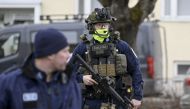 Finnish police officers investigate at the primary Viertola comprehensive school where a child opened fire and injured three other children, on April 2, 2024 in Vantaa, outside the Finnish capital Helsinki. Photo by Markku Ulander / Lehtikuva / AFP.