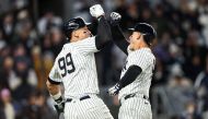 Anthony Rizzo #48 of the New York Yankees celebrates his home run with Aaron Judge #99 of the New York Yankees during the fifth inning of the game against the Toronto Blue Jays at Yankee Stadium on April 06, 2024 in New York City. (Photo by Dustin Satloff / GETTY IMAGES NORTH AMERICA / Getty Images via AFP)
