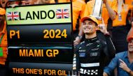 Race winner Lando Norris of Great Britain and McLaren celebrates victory with his team after the F1 Grand Prix of Miami at Miami International Autodrome on May 05, 2024 in Miami, Florida. Chris Graythen/Getty Images/AFP