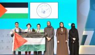 Vice Chairperson and CEO of Qatar Foundation H E Sheikha Hind bint Hamad Al Thani honours the winning team from An-Najah National University in Palestine.