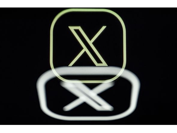 (Files) This photograph taken on March 7, 2024, in Nantes, shows the logo of US social media platform X, Twitter. (Photo by LOIC VENANCE / AFP)