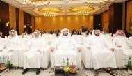 Undersecretary of MECC H E Abdulaziz bin Ahmed Al Mahmoud (centre) and Assistant Undersecretary for Climate Change Affairs Eng Ahmed Mohammed Al Sada (second left) with other officials during the workshop.