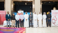 Vodafone Qatar employees participating in a blood donation drive.