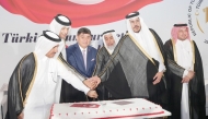 Speaker of the Shura Council H E Hassan Bin Abdullah Al Ghanem (second left) with Minister of Endowments and Islamic Affairs H E Ghanem bin Shaheen bin Ghanem Al Ghanim (third right), Minister of Commerce and Industry H E Sheikh Mohammed bin Hamad bin Qassim Al Abdullah Al Thani (second right), Secretary General of the Ministry of Foreign Affairs H E Dr. Ahmed bin Hassan Al Hammadi (left), Director of Protocol Department at the Ministry of Foreign Affairs H E Ambassador Ibrahim Youssef Fakhroo (right) and Ambassador of Türkiye to Qatar H E Dr. Mustafa Goksu at the event.