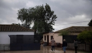 People walk in a flooded street in Jerez de la Frontera, near Cadiz, on October 31, 2024, after heavy rains hit southern Spain. (Photo by Jorge Guerrero / AFP)