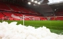 A photograph taken on January 5, 2025 shows pile of snows on the side of the pitch prior to the English Premier League football match between Liverpool and Manchester United at Anfield in Liverpool, north west England. (Photo by Darren Staples / AFP) 
