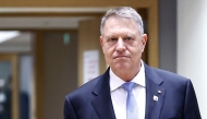 (FILES) Romania's President Klaus Iohannis arrives to attend a European Council summit at the EU headquarters in Brussels on March 21, 2024. (Photo by Sameer Al-Doumy / AFP)

