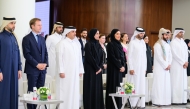 Minister of Environment and Climate Change H E Dr. Abdullah bin Abdulaziz bin Turki Al Subaie (third left); Minister of Social Development and Family H E Buthaina bint Ali Al Jabr Al Nuaimi (fourth left); and other officials and guests at the event.   