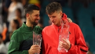 Jakub Mensik talks with Novak Djokovic (left) after the men’s singles final.