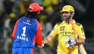 Chennai Super Kings' Mahendra Singh Dhoni (R) greets Delhi Capitals' KL Rahul at the end of the Indian Premier League (IPL) Twenty20 cricket match between Chennai Super Kings and Delhi Capitals at the MA Chidambaram Stadium in Chennai on April 5, 2025. (Photo by R.Satish Babu / AFP)