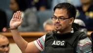 (Files) This file photo taken on November 23, 2016 shows Kerwin Espinosa taking an oath during the Senate drug hearing at the Senate building in Manila. (Photo by Noel Celis / AFP) 
