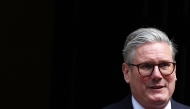 Britain's Prime Minister Keir Starmer leaves 10 Downing Street in central London on May 7, 2025, to take part in the weekly session of Prime Minister's Questions (PMQs). (Photo by Henry Nicholls / AFP)