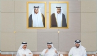  Minister of Public Health H E Mansoor bin Ebrahim Al Mahmoud  with other officials during the meeting.