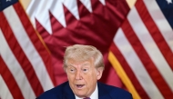US President Donald Trump attends a breakfast with business leaders in Doha on May 15, 2025. (Photo by Brendan Smialowski / AFP)