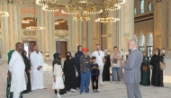 Visitors are briefed during a tour to Sheikh Hamad bin Jassim bin Jaber Al Thani Mosque. 