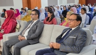 Principal Chaudhary Mohammad Afzal and cybersecurity expert Dr. Ahmad Javaid with PISQ teachers and students at a session.