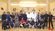 Sheikh Abdulla Bin Zaid Al-Mahmoud Islamic Cultural Center officials with participants during an activity. 