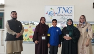 A winner with school officials.