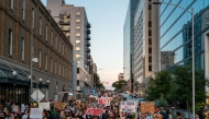 People march through downtown during an 